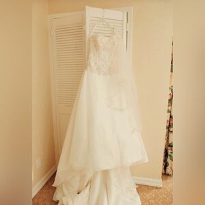 Custom made French lace wedding gown size 4-6 come with matching head piece